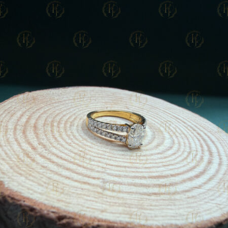 Engagement Ring with Oval shape big Diamond and Round shape small Diamond with Yellow tone