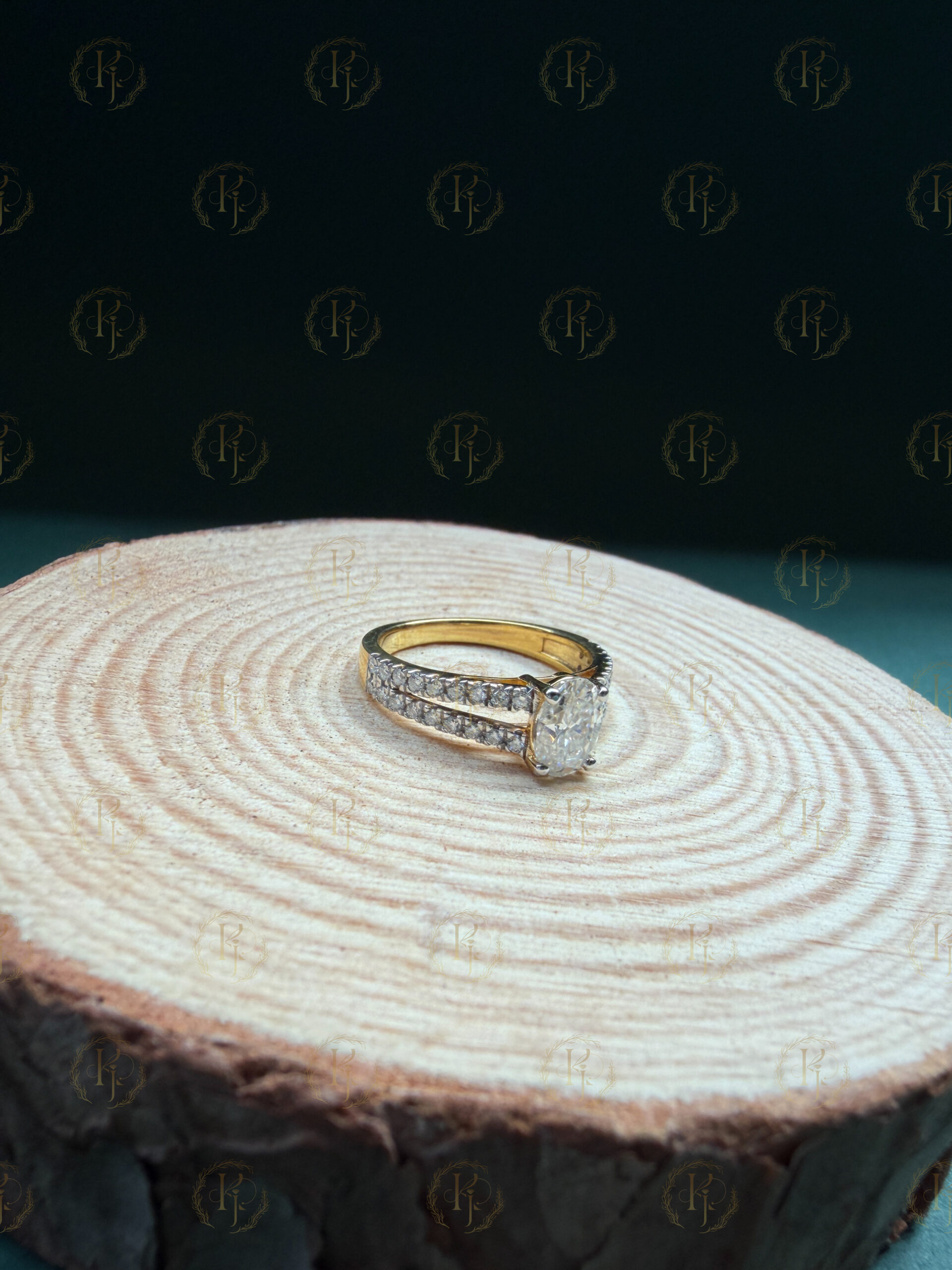 Engagement Ring with Oval shape big Diamond and Round shape small Diamond with Yellow tone