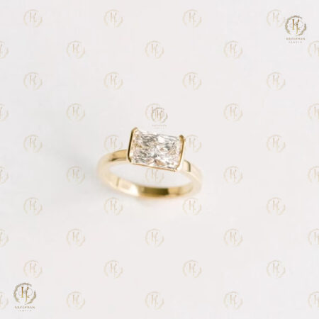 1.50 CT Emerald Cut Diamond East West Bezel Set